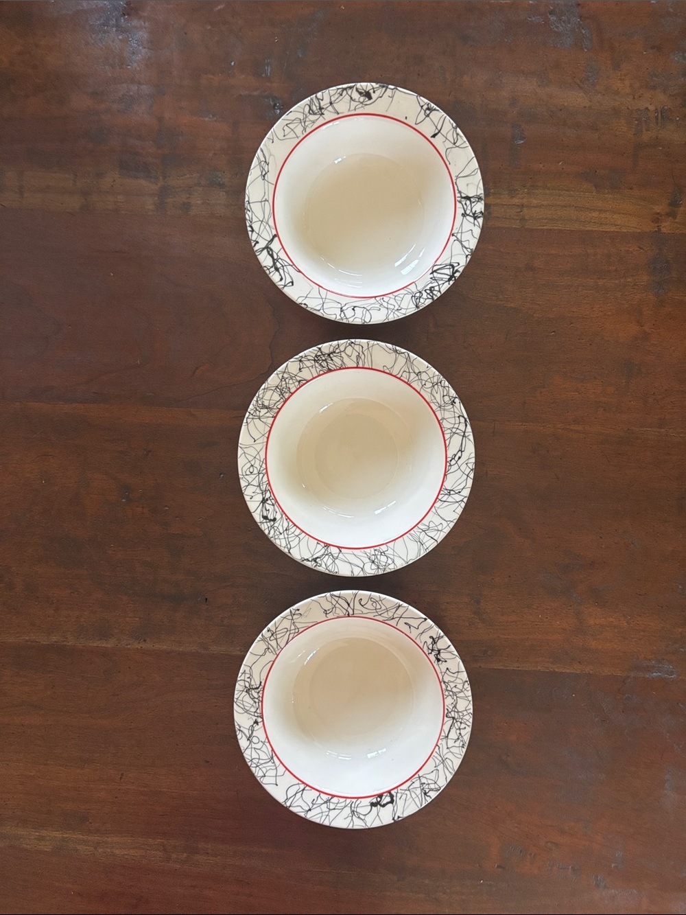 Homer Laughlin Dinner Bowls with Black Scribble Rim and Red Accent